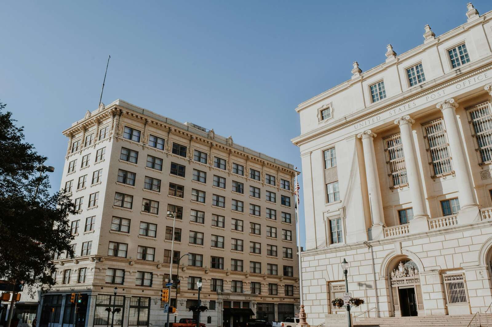 Historic stone office buildings at a downtown San Antonio corner