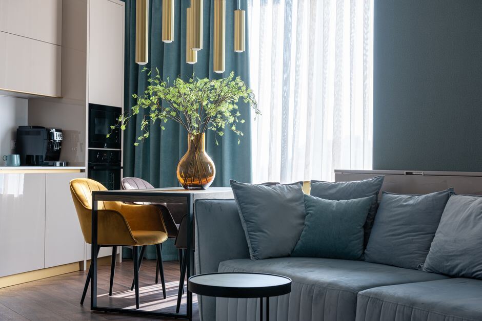 Furnished apartment living and dining area