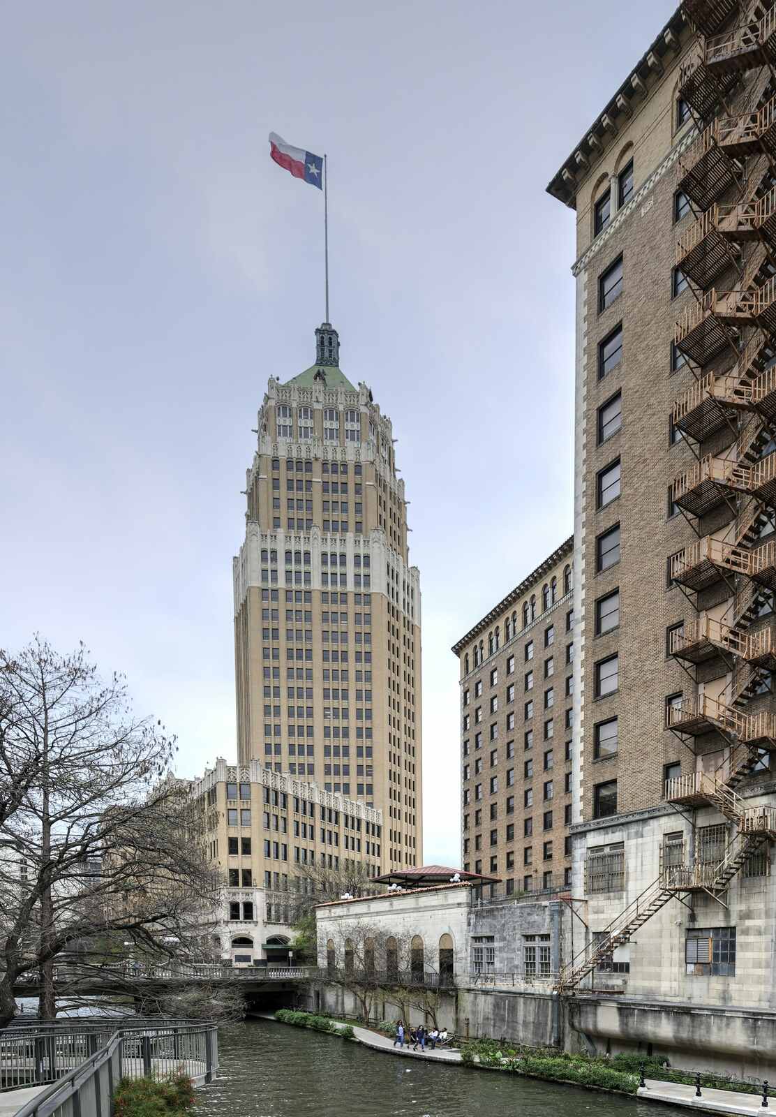The Tower Life Building above a bend of the San Antonio River